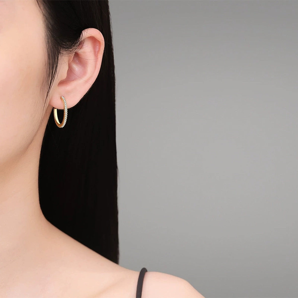 Pave Moissanite Hoop Earrings in Yellow Gold-Plated S925 Silver worn on ear by model
