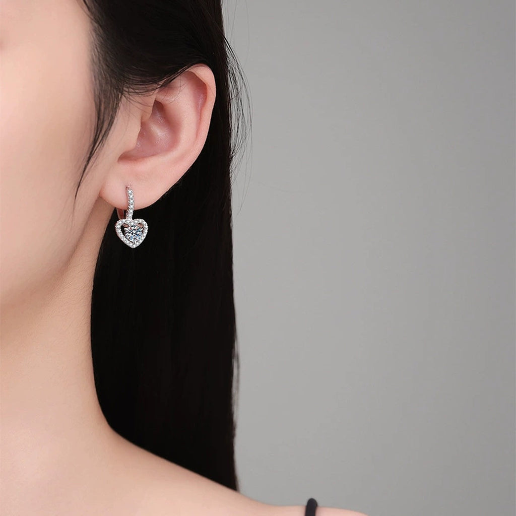 Heart Halo Moissanite Hoop Drop Earrings with CZ in White Gold-Plated S925 Sterling Silver worn on ear by model