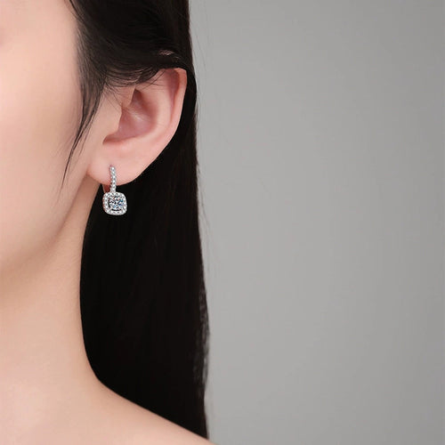 Cushion Halo Moissanite Hoop Drop Earrings with CZ in White Gold-Plated S925 Sterling Silver worn on ear by model