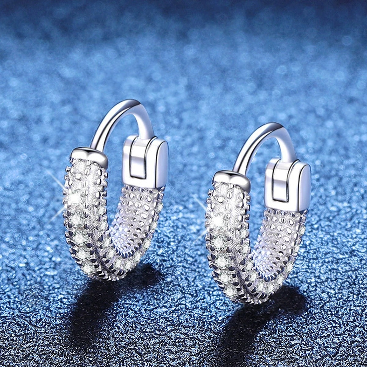 Pave Moissanite Hoop Earrings in White Gold-Plated S925 Sterling Silver blue scene angled view