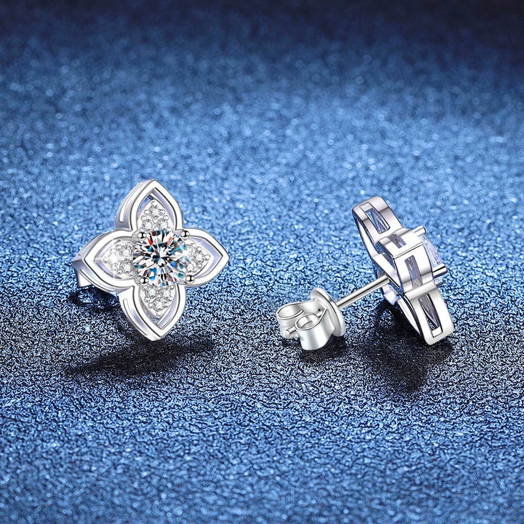 Four-Petal Moissanite Stud Earrings with CZ in White Gold-Plated S925 Sterling Silver blue scene close-up view
