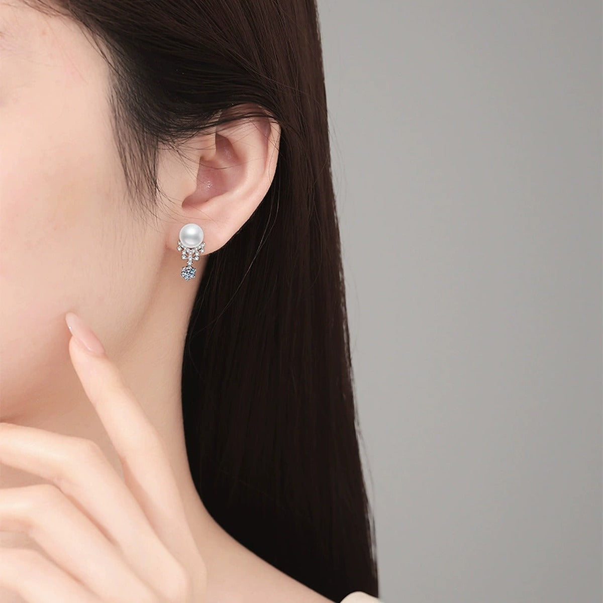 Snowflake Pearl Moissanite Stud Drop Earrings with CZ in White Gold-Plated S925 Sterling Silver worn on ear by model
