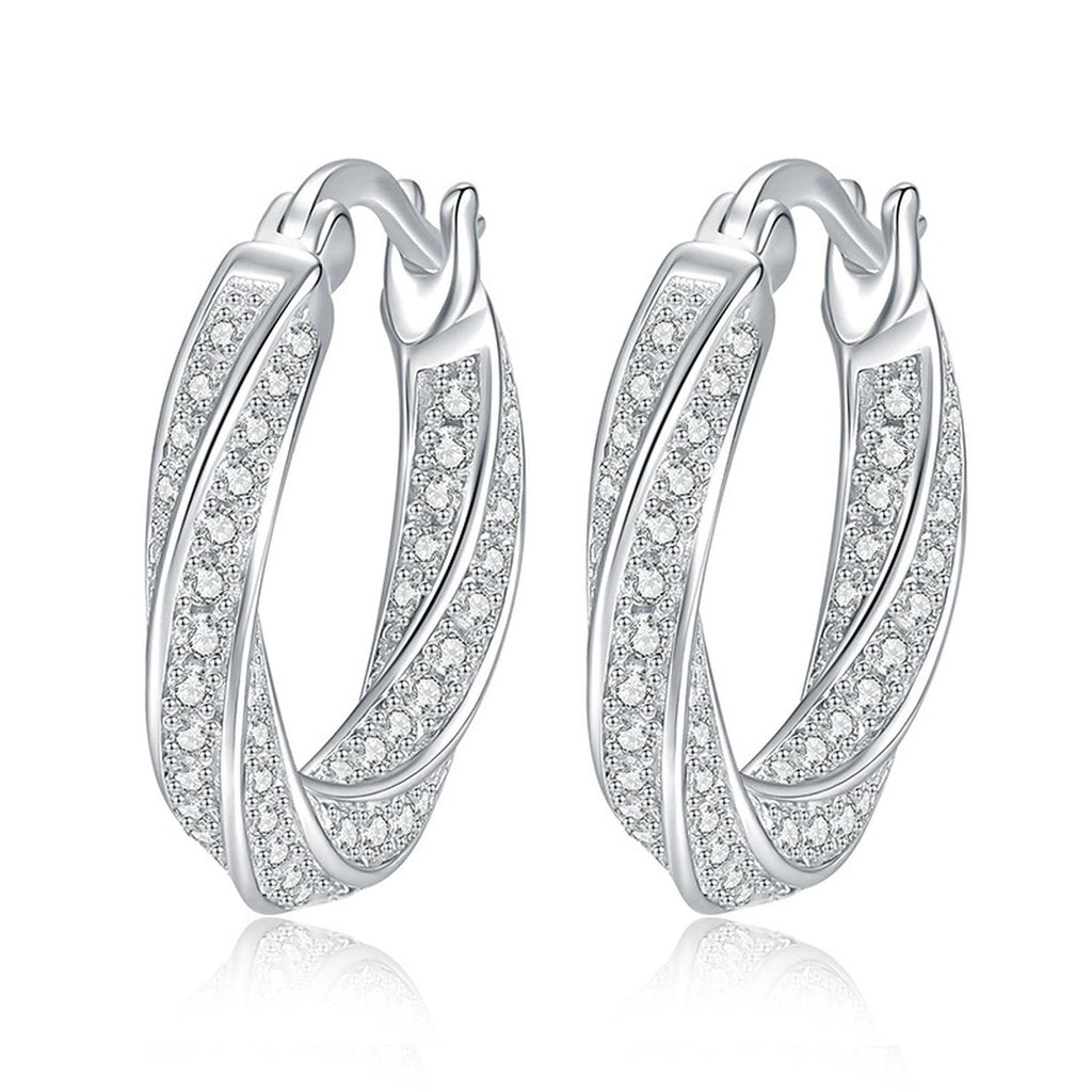 Twist Pave Moissanite Hoop Earrings in White Gold-Plated S925 Sterling Silver on clean white background showing a twisted open hoop profile traced with small moissanite stones