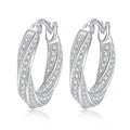 Twist Pave Moissanite Hoop Earrings in White Gold-Plated S925 Sterling Silver on clean white background showing a twisted open hoop profile traced with small moissanite stones