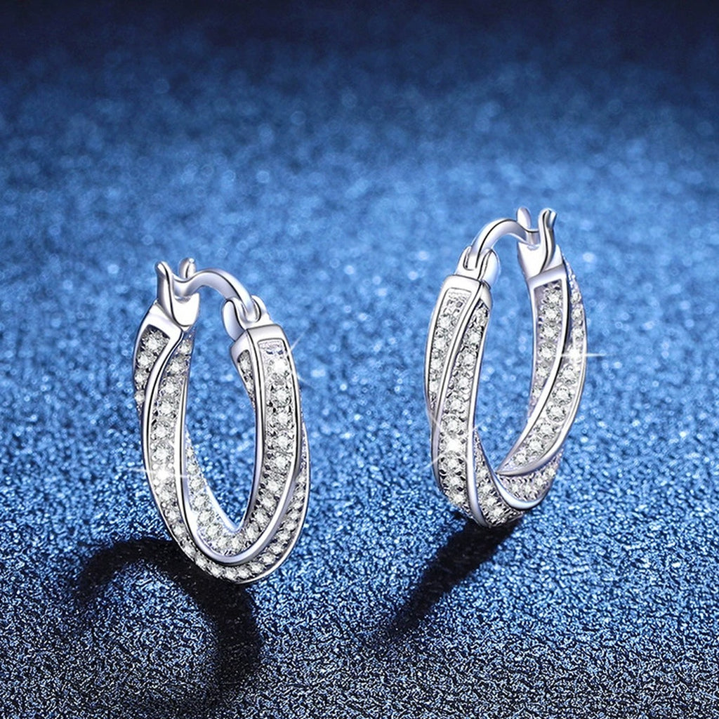 Twist Pave Moissanite Hoop Earrings in White Gold-Plated S925 Sterling Silver blue scene angled view