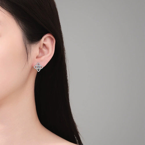 Compass Star Moissanite Stud Earrings with CZ in White Gold-Plated S925 Sterling Silver worn on ear by model