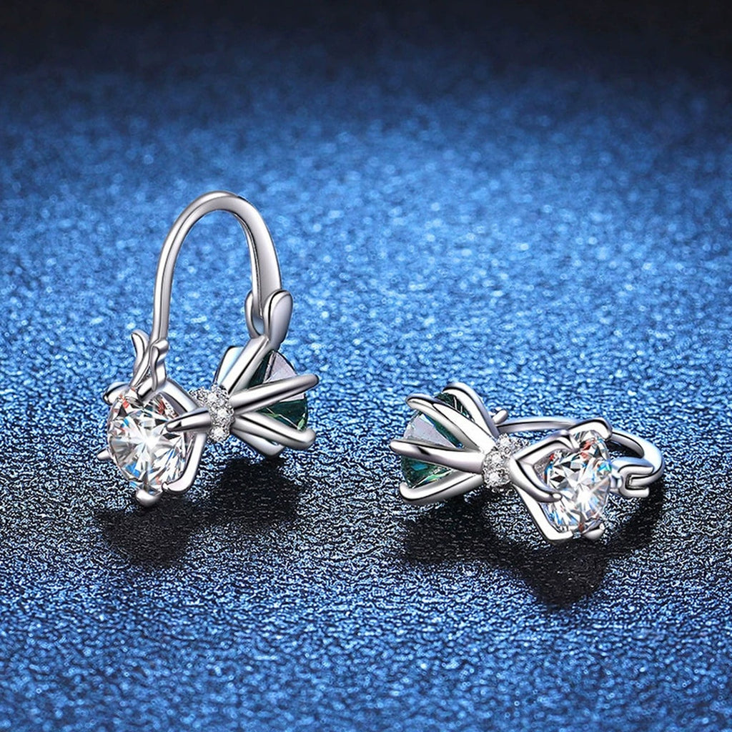 Green and White Moissanite Star Drop Earrings with CZ in White Gold-Plated S925 Sterling Silver blue scene close-up view