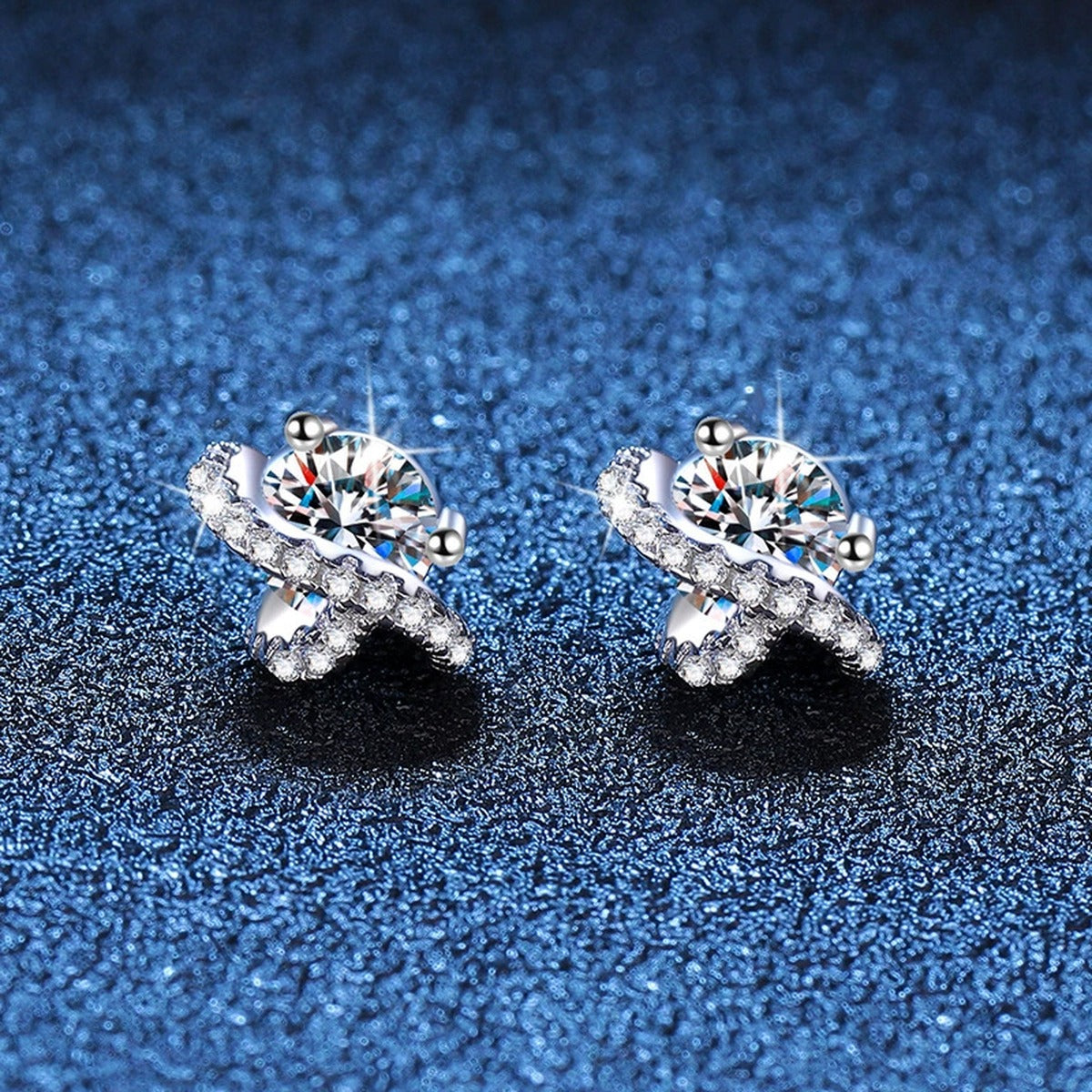 Star Moissanite Stud Earrings with CZ in White Gold-Plated S925 Sterling Silver blue scene angled view