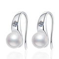 Pearl Moissanite Hook Drop Earrings in White Gold-Plated S925 Sterling Silver on clean white background showing a curved hook drop earring with a pearl and small moissanite accent