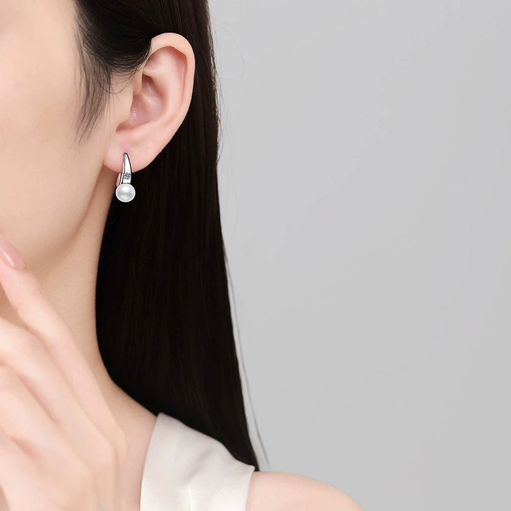 Pearl Moissanite Hook Drop Earrings in White Gold-Plated S925 Sterling Silver worn on ear by model