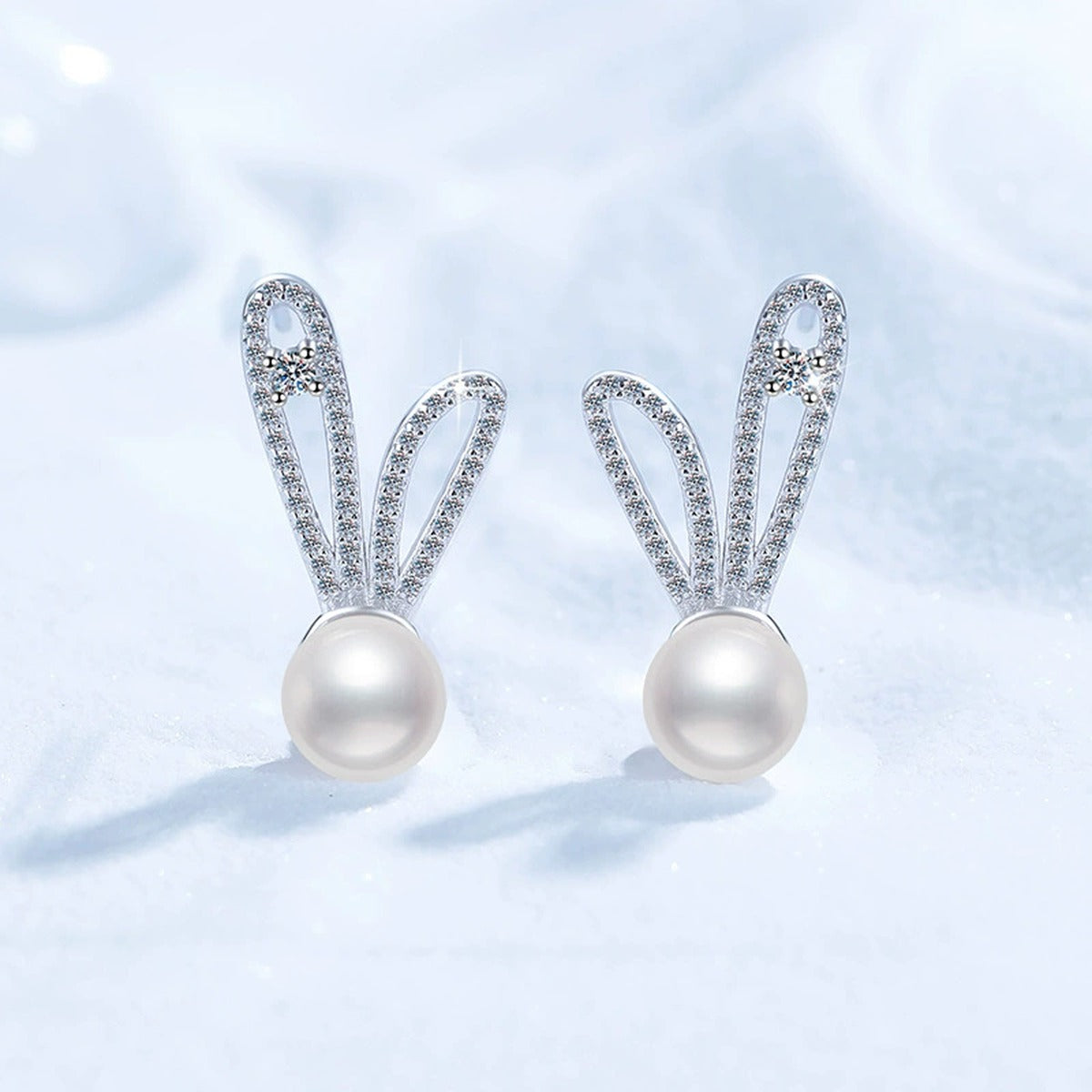 Bunny Pearl Moissanite Stud Drop Earrings with CZ in White Gold-Plated S925 Sterling Silver close-up product detail view