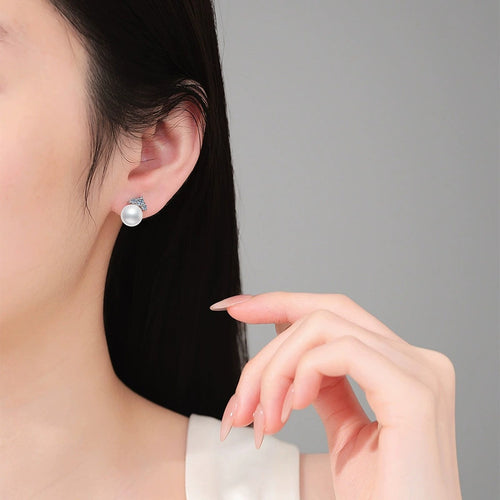 Crown Pearl Moissanite Stud Earrings in White Gold-Plated S925 Sterling Silver worn on ear by model