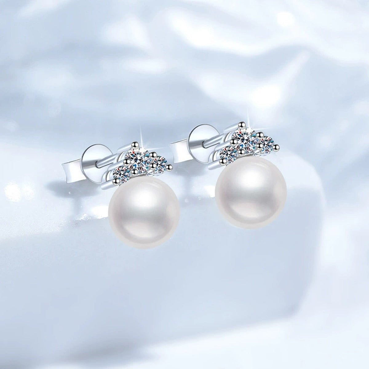 Crown Pearl Moissanite Stud Earrings in White Gold-Plated S925 Sterling Silver blue scene product view