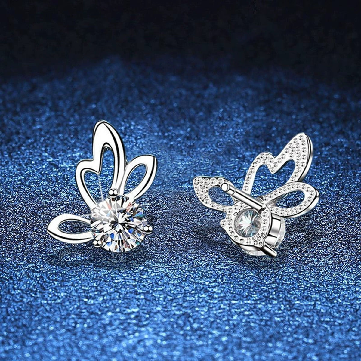 Butterfly Moissanite Stud Earrings in White Gold-Plated S925 Sterling Silver blue scene close-up view