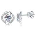 Swirl Moissanite Stud Earrings with CZ in White Gold-Plated S925 Sterling Silver on clean white background showing a rounded swirl stud frame around a round moissanite center