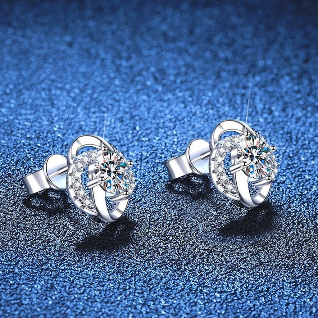 Swirl Moissanite Stud Earrings with CZ in White Gold-Plated S925 Sterling Silver blue scene angled view
