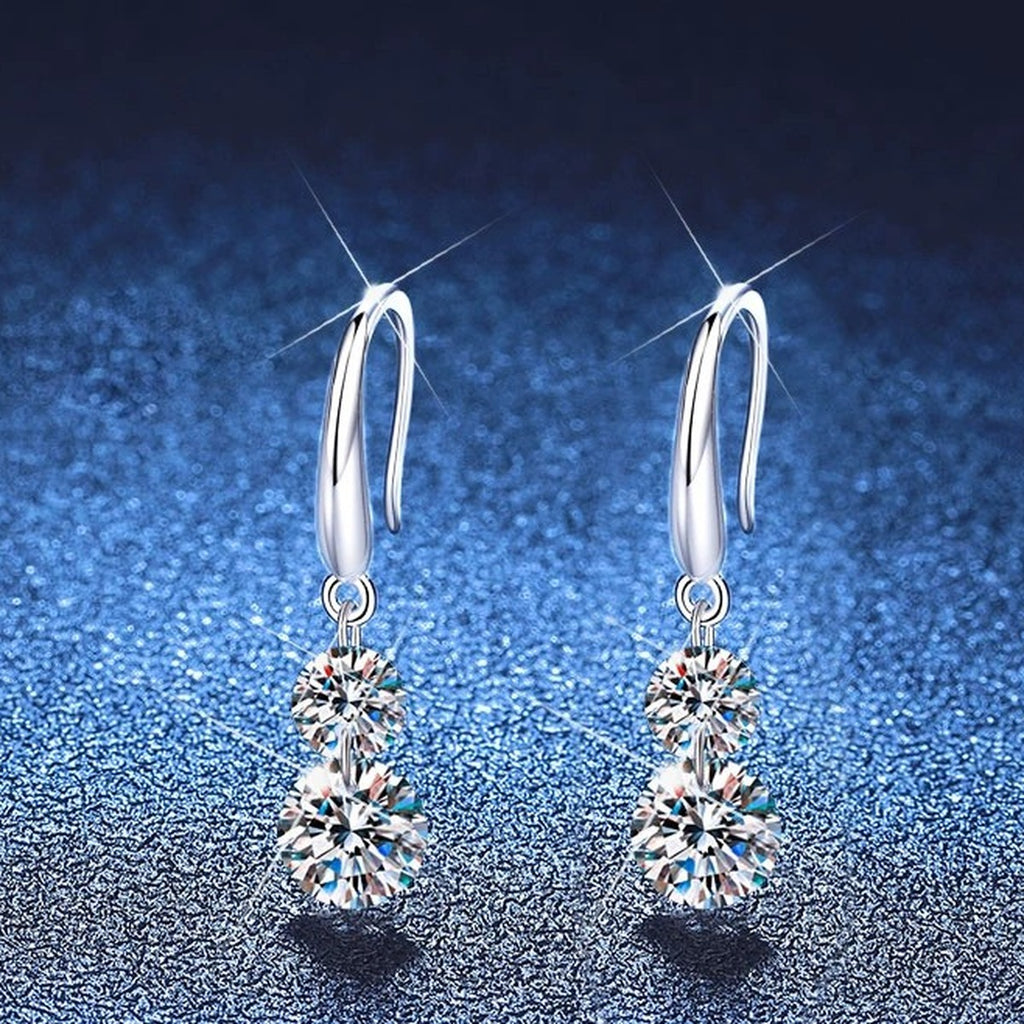 Two-Stone Moissanite Drop Earrings in White Gold-Plated S925 Sterling Silver blue scene angled view