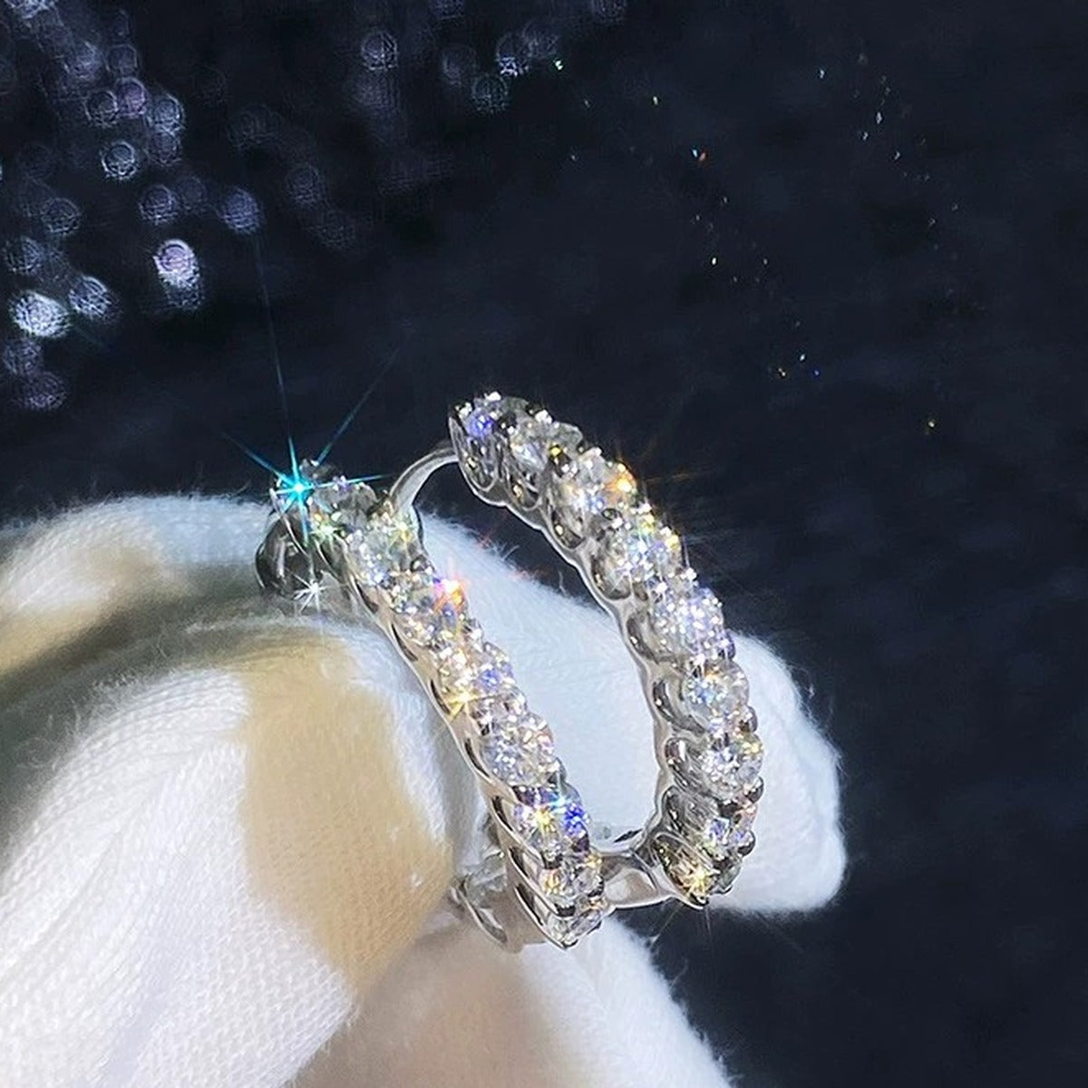 Oval Pave Moissanite Hoop Earrings in White Gold-Plated S925 Sterling Silver close-up product detail view