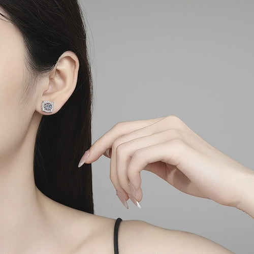 Cushion Halo Moissanite Stud Earrings with CZ in White Gold-Plated S925 Sterling Silver worn on ear by model