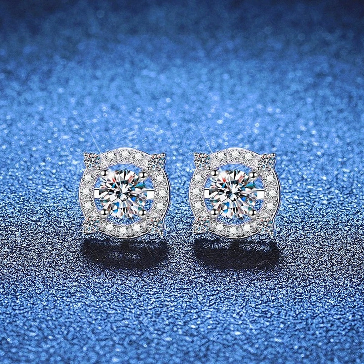 Cushion Halo Moissanite Stud Earrings with CZ in White Gold-Plated S925 Sterling Silver blue scene angled view