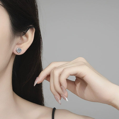 Cushion Halo Moissanite Stud Earrings in White Gold-Plated S925 Sterling Silver worn on ear by model
