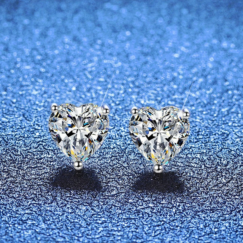 Heart Moissanite Stud Earrings in White Gold-Plated S925 Sterling Silver blue scene angled view
