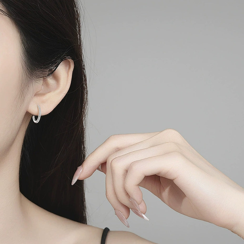 Pave Moissanite Hoop Earrings in Gold-Plated S925 Sterling Silver worn on ear by model
