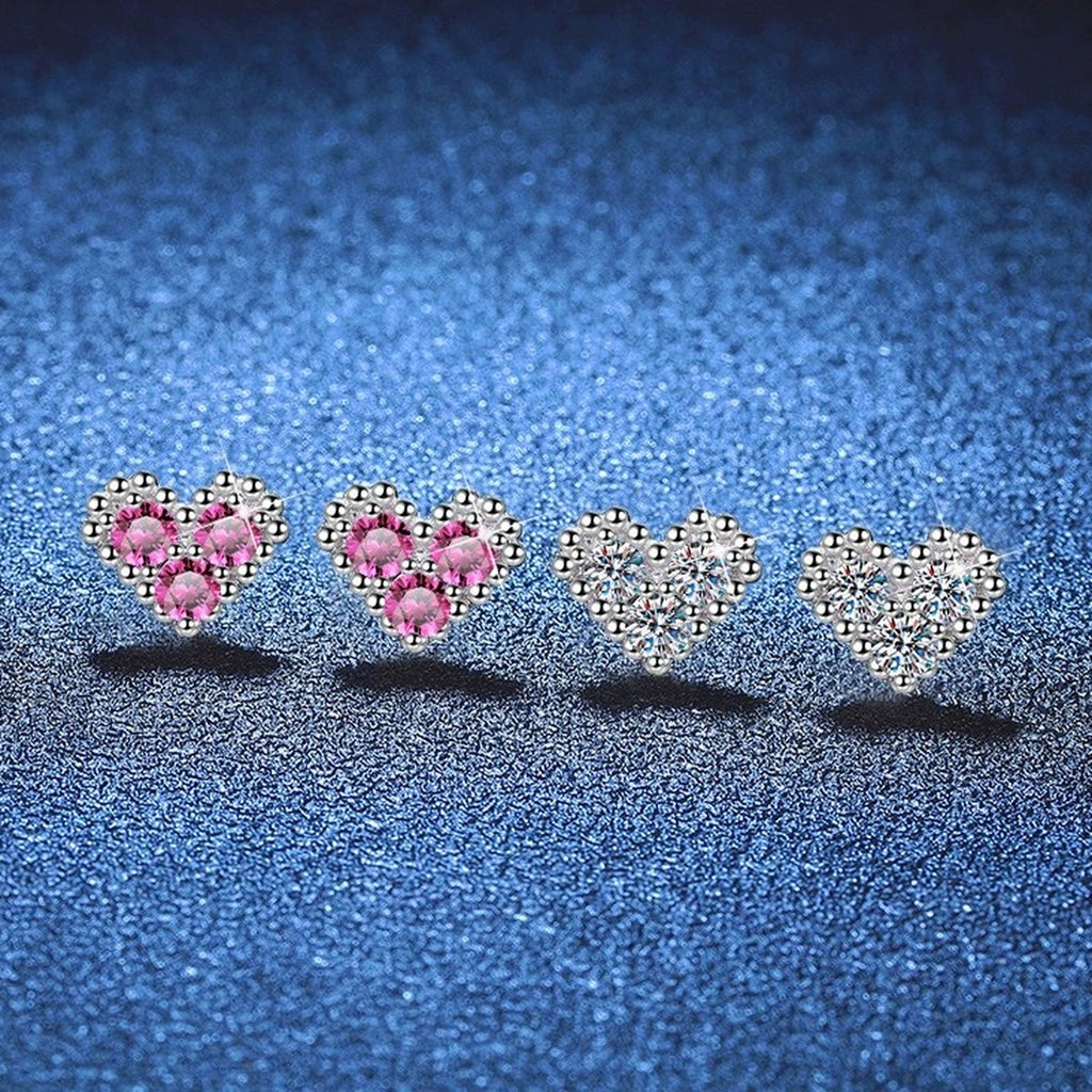 Heart Moissanite Stud Earrings in White Gold-Plated S925 Sterling Silver blue scene angled view