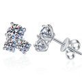 Three-Stone Moissanite Stud Earrings in White Gold-Plated S925 Sterling Silver on clean white background showing a clustered three-stone stud with two smaller round stones and one larger round stone