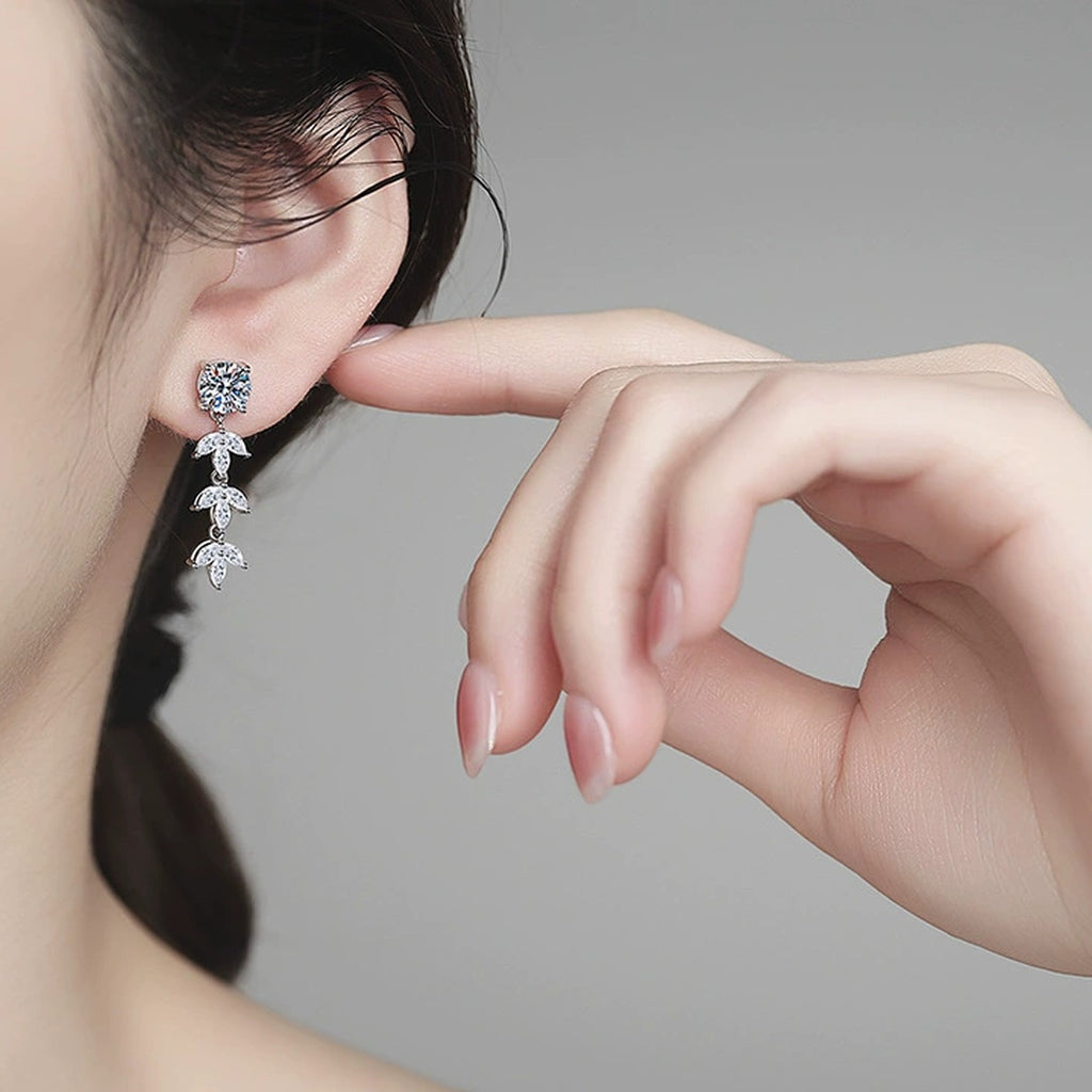 Leaf Moissanite Drop Earrings with CZ in White Gold-Plated S925 Sterling Silver worn on ear by model
