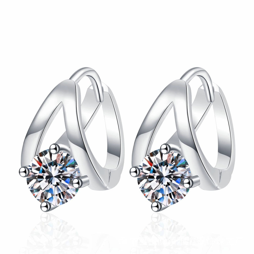 Round Moissanite Huggie Hoop Earrings in White Gold-Plated S925 Sterling Silver on clean white background showing a sculpted huggie hoop with a round moissanite focal stone