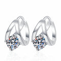 Round Moissanite Huggie Hoop Earrings in White Gold-Plated S925 Sterling Silver on clean white background showing a sculpted huggie hoop with a round moissanite focal stone