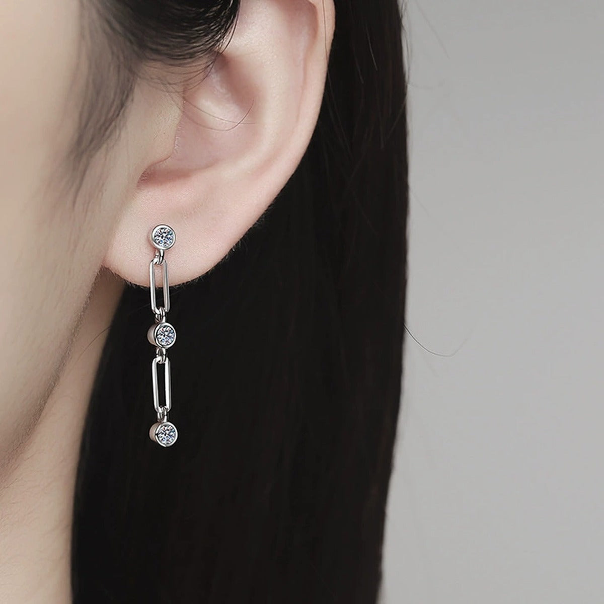 Link Chain Moissanite Drop Earrings in White Gold-Plated S925 Sterling Silver worn on ear by model
