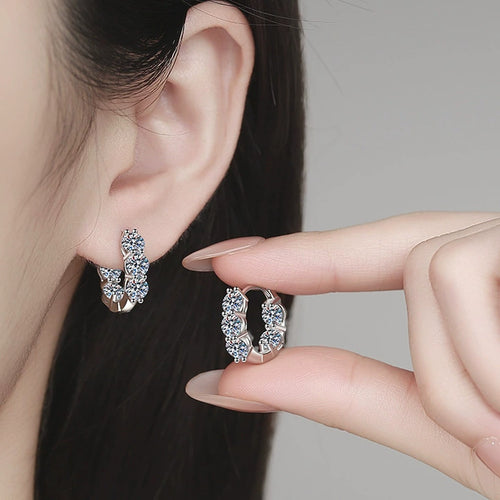 Cluster Moissanite Huggie Hoop Earrings in Gold-Plated S925 Sterling Silver worn on ear by model