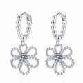 Floral Moissanite Hoop Drop Earrings in White Gold-Plated S925 Sterling Silver on clean white background showing a beaded hoop with an open flower moissanite dangle