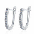 Pave Moissanite Hoop Earrings in White Gold-Plated S925 Sterling Silver on clean white background showing a slim oval hoop with pave moissanite set along the front edge