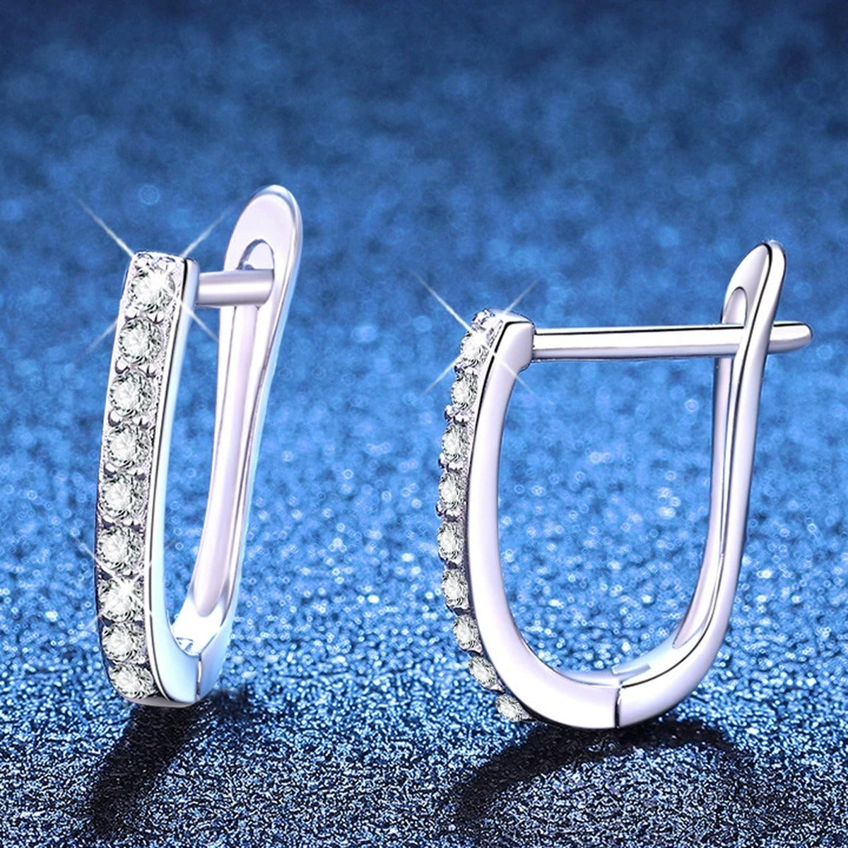 Pave Moissanite Hoop Earrings in White Gold-Plated S925 Sterling Silver blue scene angled view