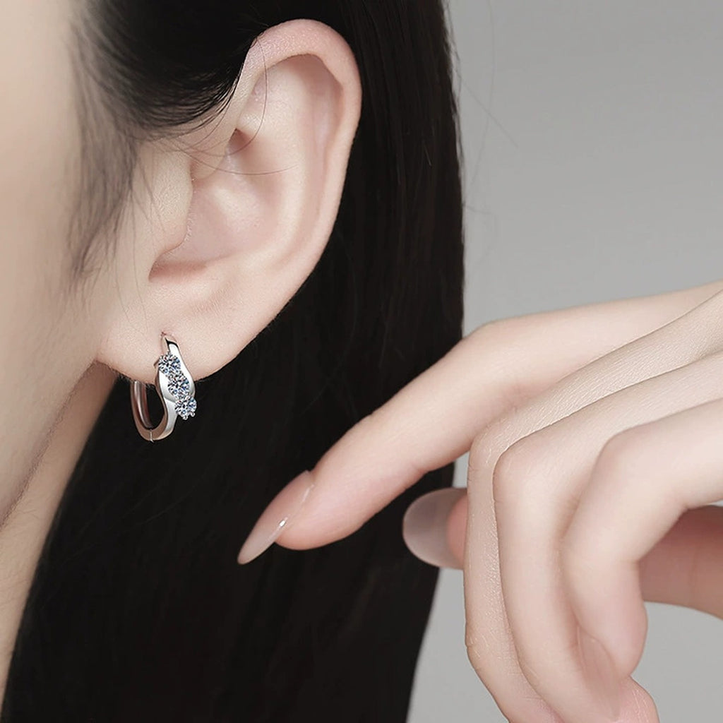Pave Moissanite Hoop Earrings in White Gold-Plated S925 Sterling Silver worn on ear by model