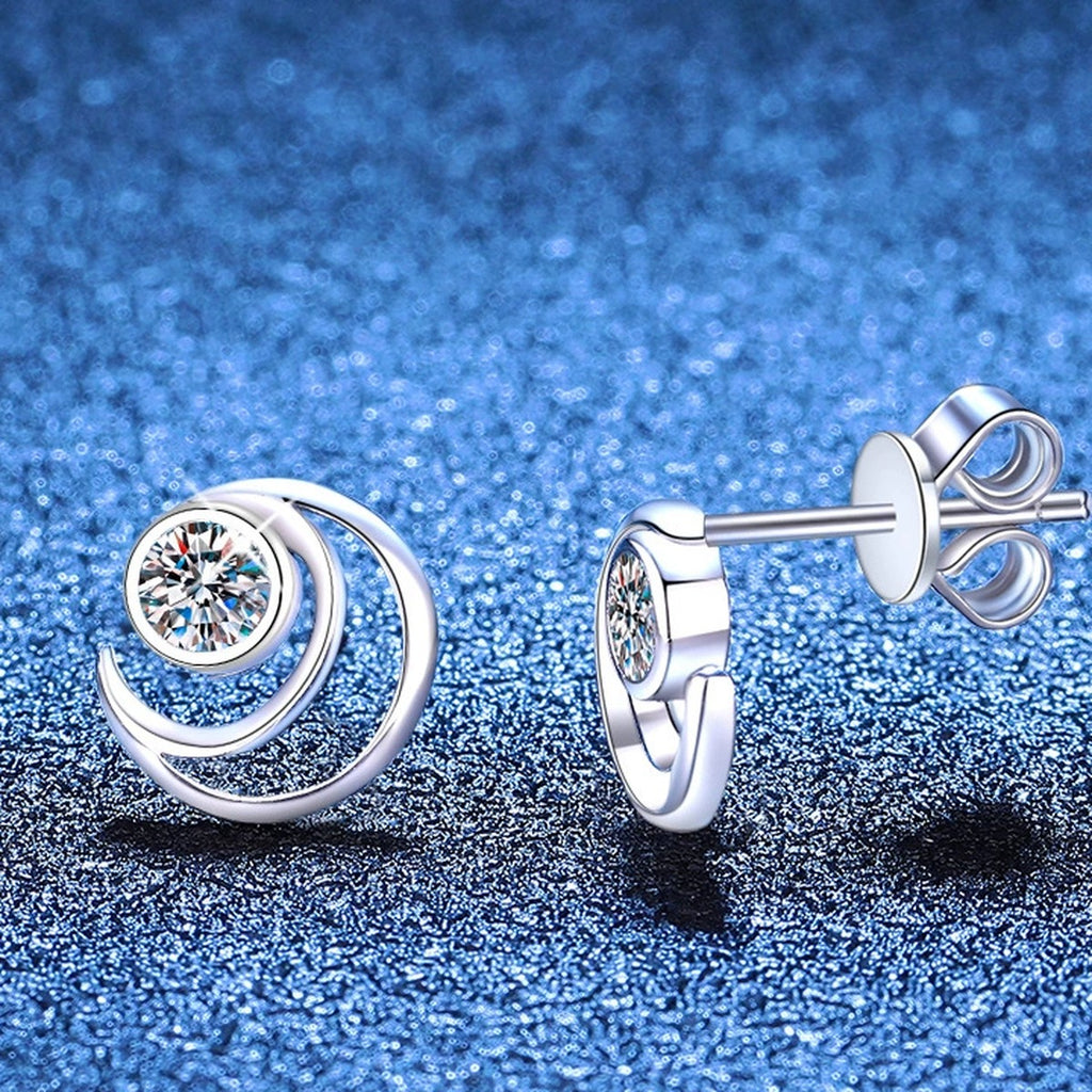 Moon Moissanite Stud Earrings in White Gold-Plated S925 Sterling Silver blue scene angled view