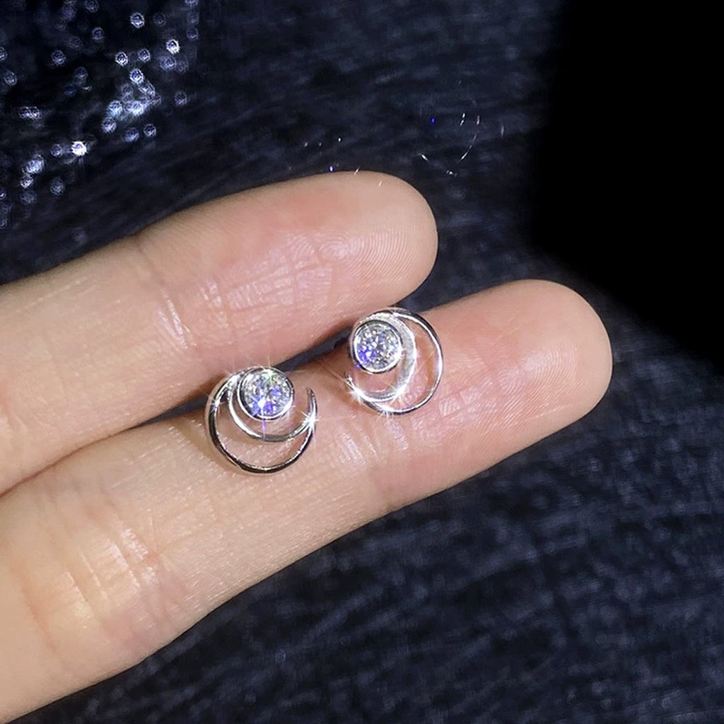 Moon Moissanite Stud Earrings in White Gold-Plated S925 Sterling Silver close-up product detail view