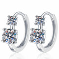 Two-Stone Moissanite Hoop Earrings in White Gold-Plated S925 Sterling Silver on clean white background showing a hoop earring with two round moissanite stones set along the front