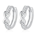 Twisted Pave Moissanite Hoop Earrings in White Gold-Plated S925 Sterling Silver on clean white background showing a small twisted hoop with pave moissanite texture