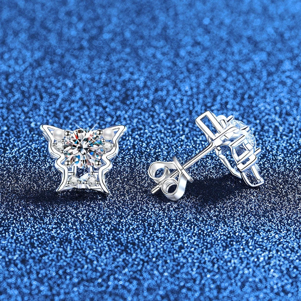 Bow Moissanite Stud Earrings with CZ in White Gold-Plated S925 Sterling Silver blue scene angled view