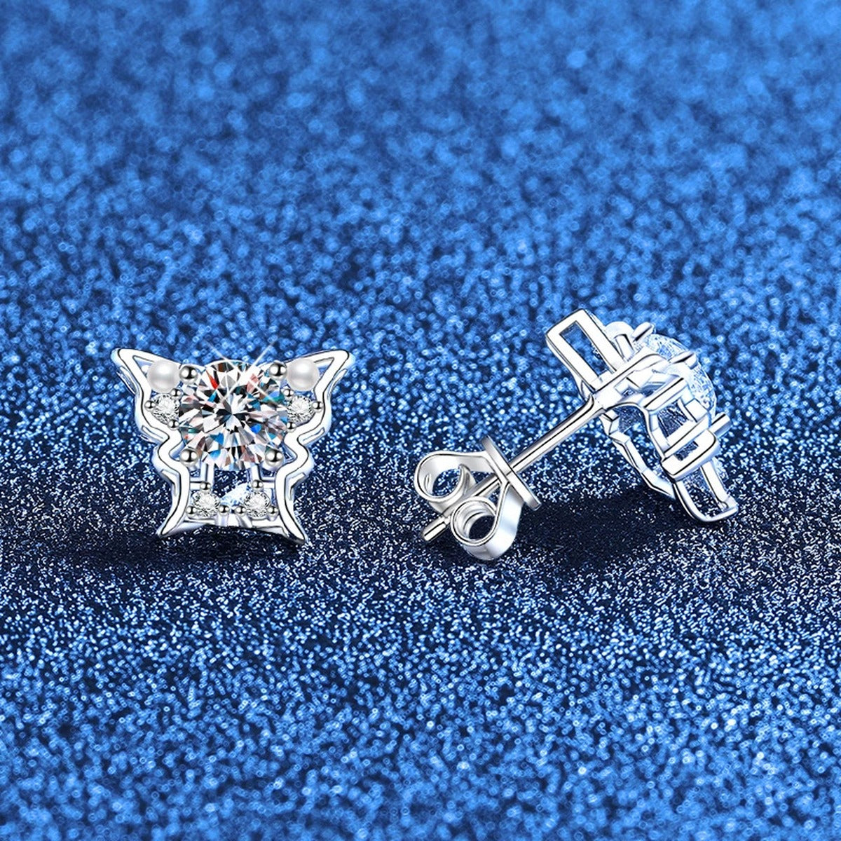 Bow Moissanite Stud Earrings with CZ in White Gold-Plated S925 Sterling Silver blue scene angled view