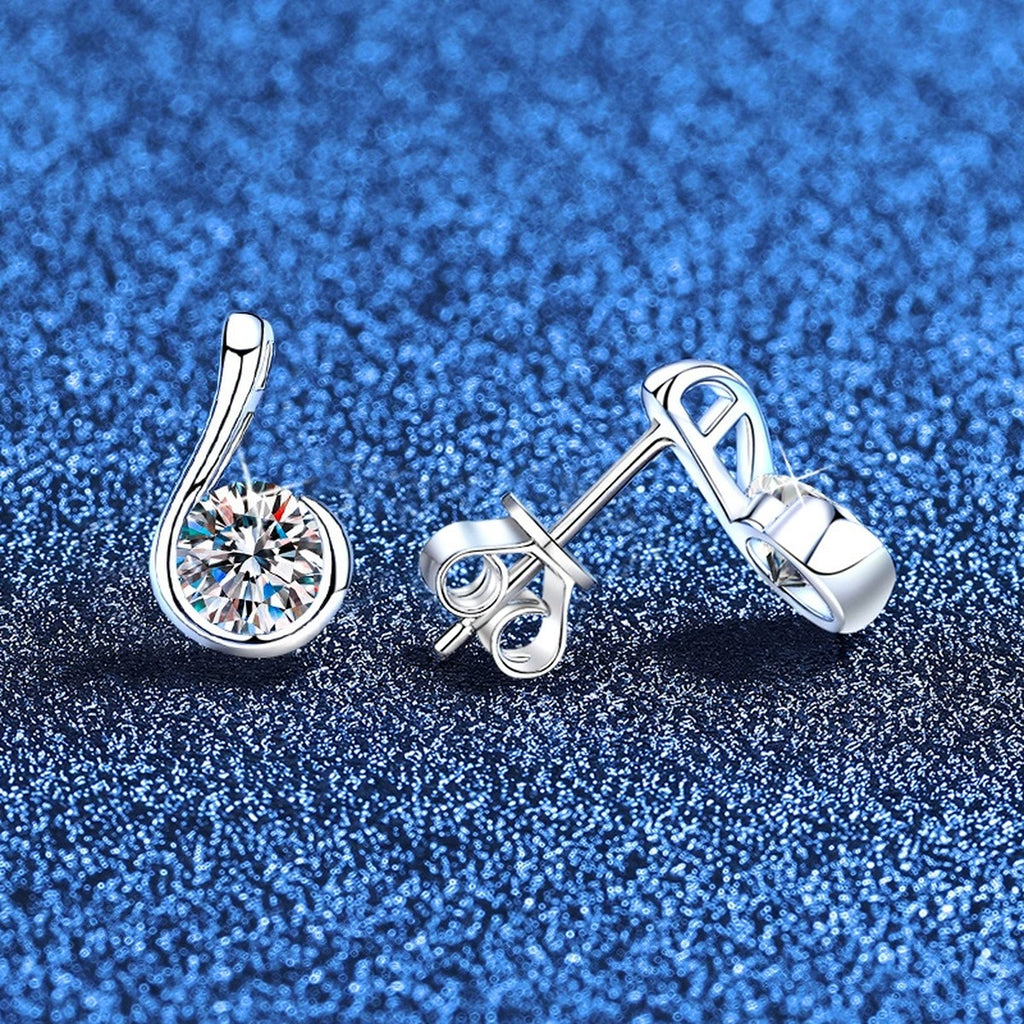 Curved Teardrop Moissanite Stud Earrings in White Gold-Plated S925 Sterling Silver blue scene product view