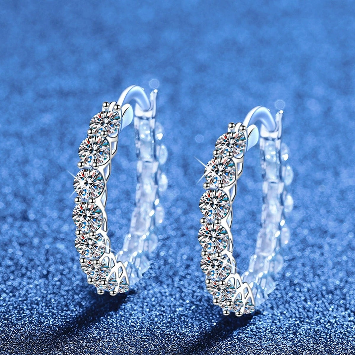 Large Pave Moissanite Hoop Earrings in White Gold-Plated S925 Sterling Silver blue scene product view