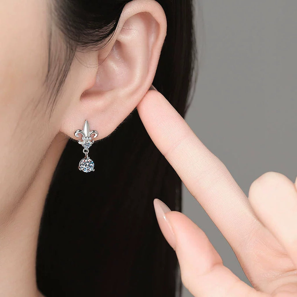 Fleur-De-Lis Moissanite Drop Earrings with CZ in White Gold-Plated S925 Sterling Silver worn on ear by model