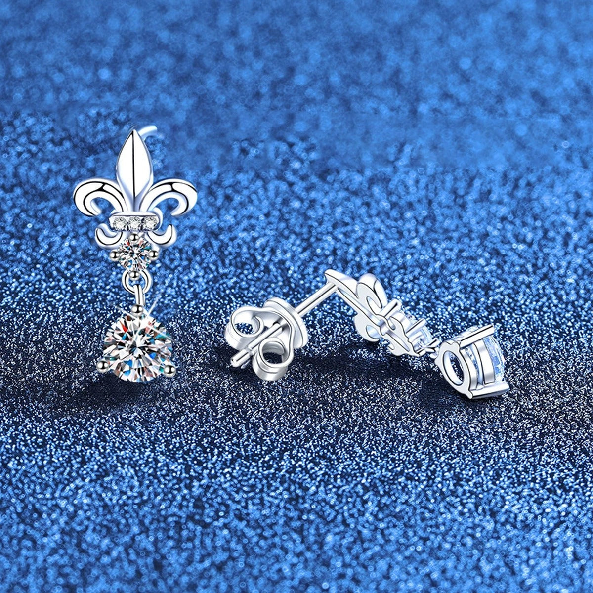 Fleur-De-Lis Moissanite Drop Earrings with CZ in White Gold-Plated S925 Sterling Silver blue scene angled view