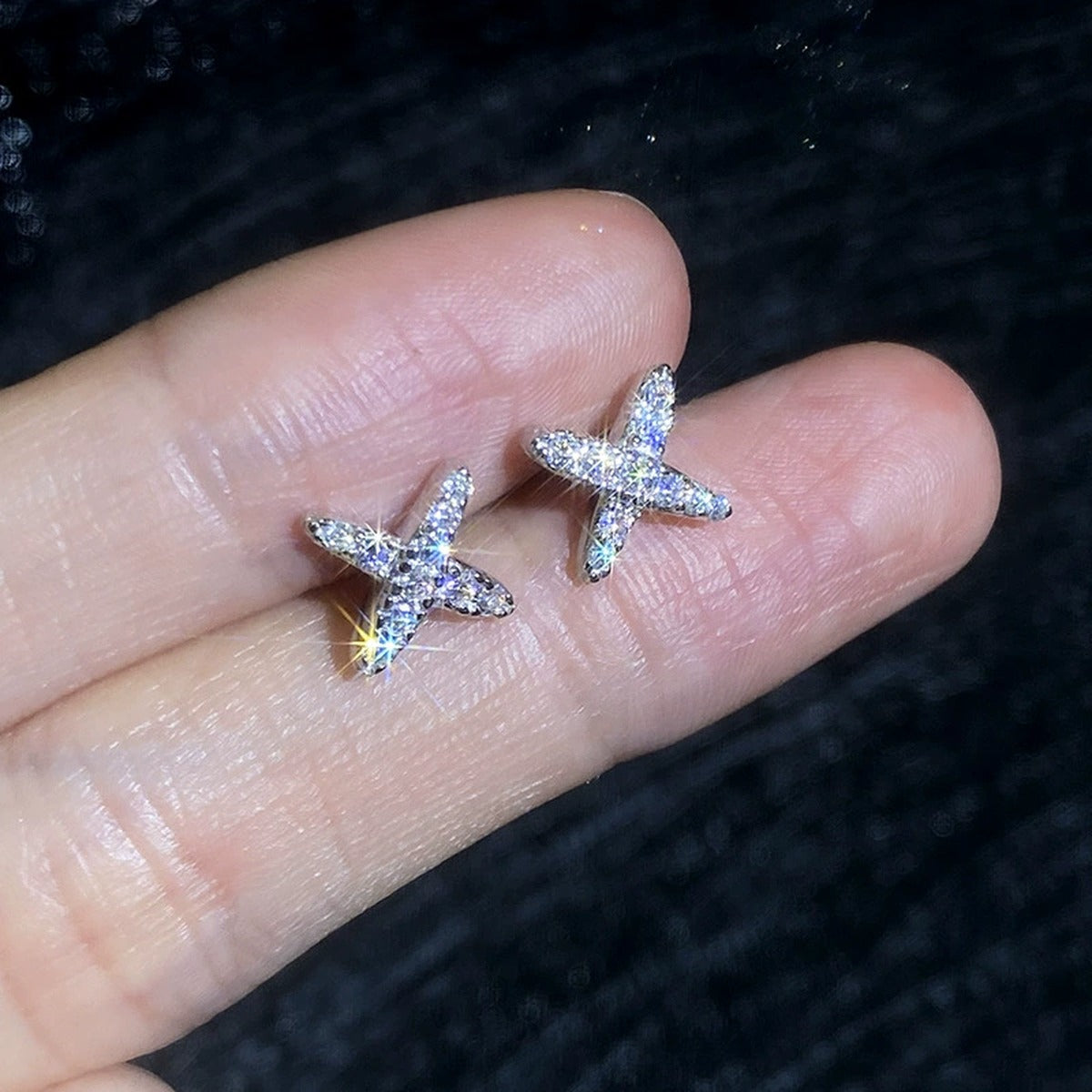 Cross Moissanite Stud Earrings in White Gold-Plated S925 Sterling Silver close-up product detail view