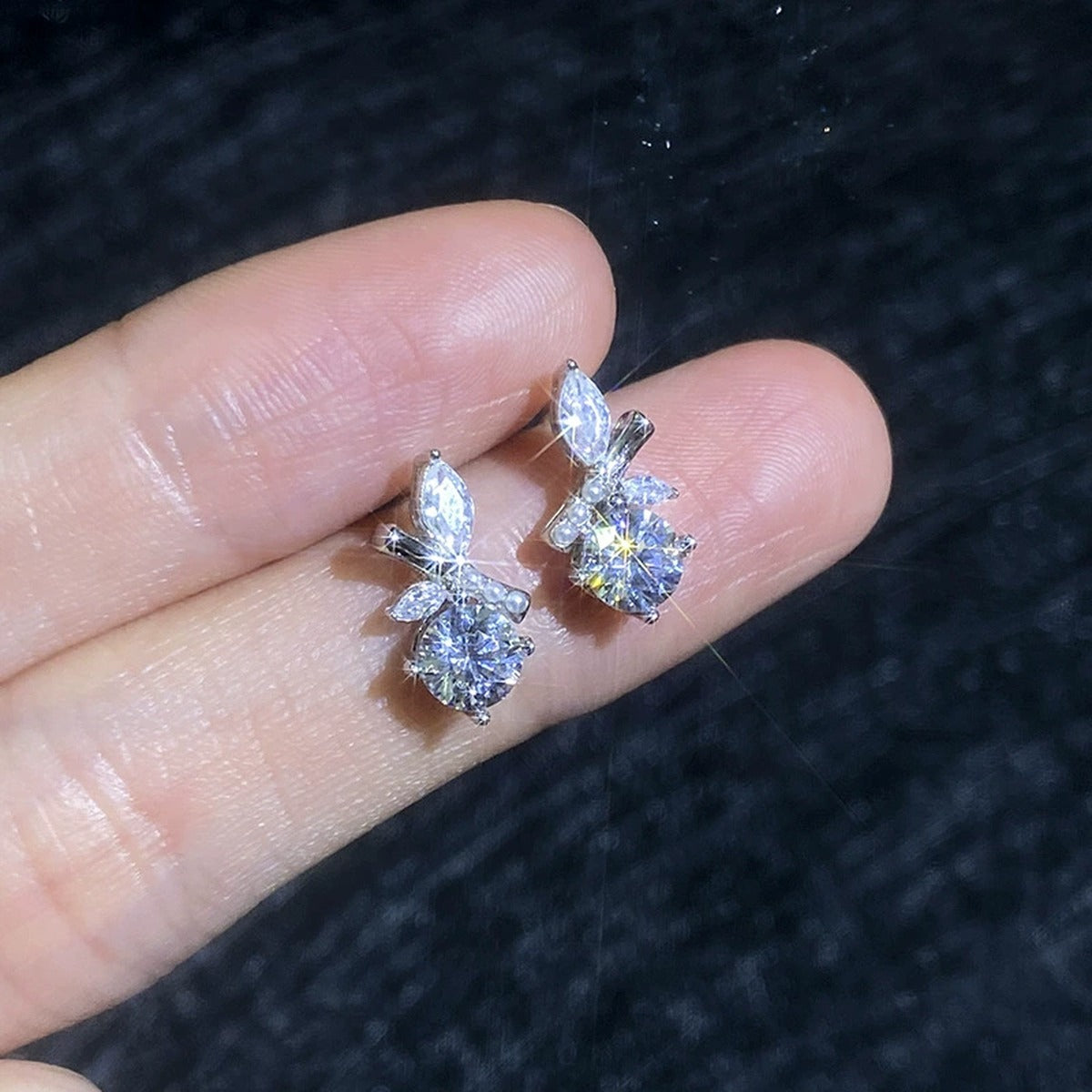 Leaf Accent Moissanite Stud Earrings with CZ in White Gold-Plated S925 Sterling Silver close-up product detail view